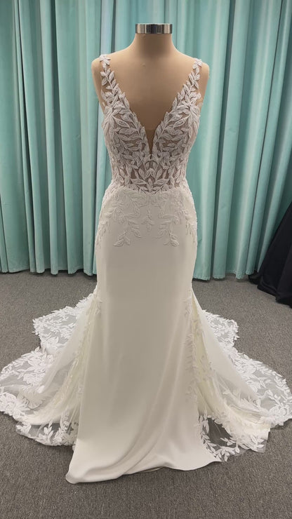 Essense of Australia D4037 crepe sheath wedding dress with plunging V-neckline, sheer lace bodice, side cutouts, and low back with lace train