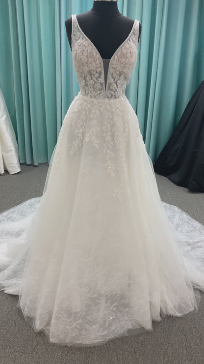 Morilee Style 2736 botanical A-line wedding dress with plunging v-neckline, beaded trim, 3D embroidered lace over Chantilly lace, and open v-back