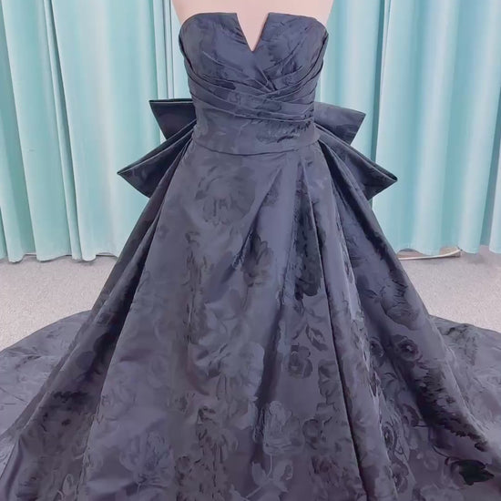 Wednesday Ballgown Wedding Dress in Black Brocade, Size 10 — floral jacquard, strapless neckline, oversized bow back