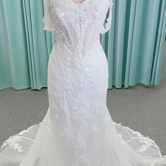 Randy Fenoli Jillian fit and flare wedding dress on mannequin with strapless sweetheart neckline, beaded lace appliqué, detachable off-the-shoulder straps, and glitter tulle skirt