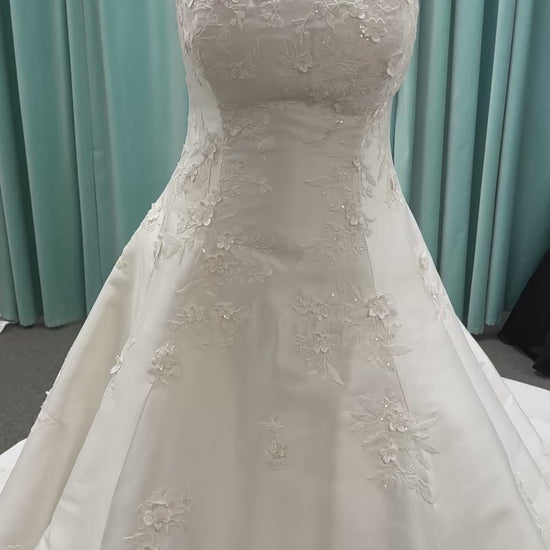 Plus Size Strapless Mikado A-line wedding dress with straight neckline, lace detailing, and full skirt with hip volume by Essense of Australia Style D4479