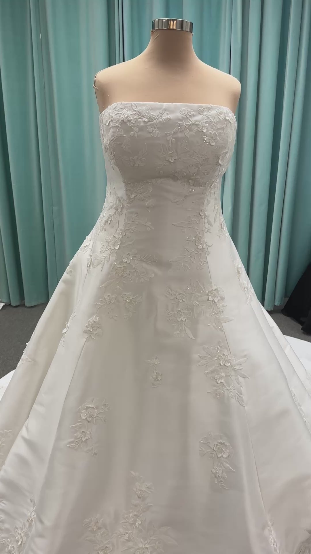Plus Size Strapless Mikado A-line wedding dress with straight neckline, lace detailing, and full skirt with hip volume by Essense of Australia Style D4479