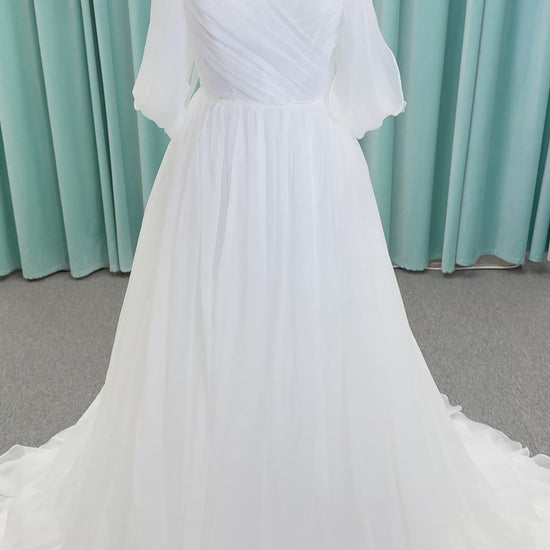 Morilee 2910L Levana A-line wedding dress on mannequin with sweetheart strapless neckline, off-the-shoulder sleeves, draped organza bodice, and beaded waistband