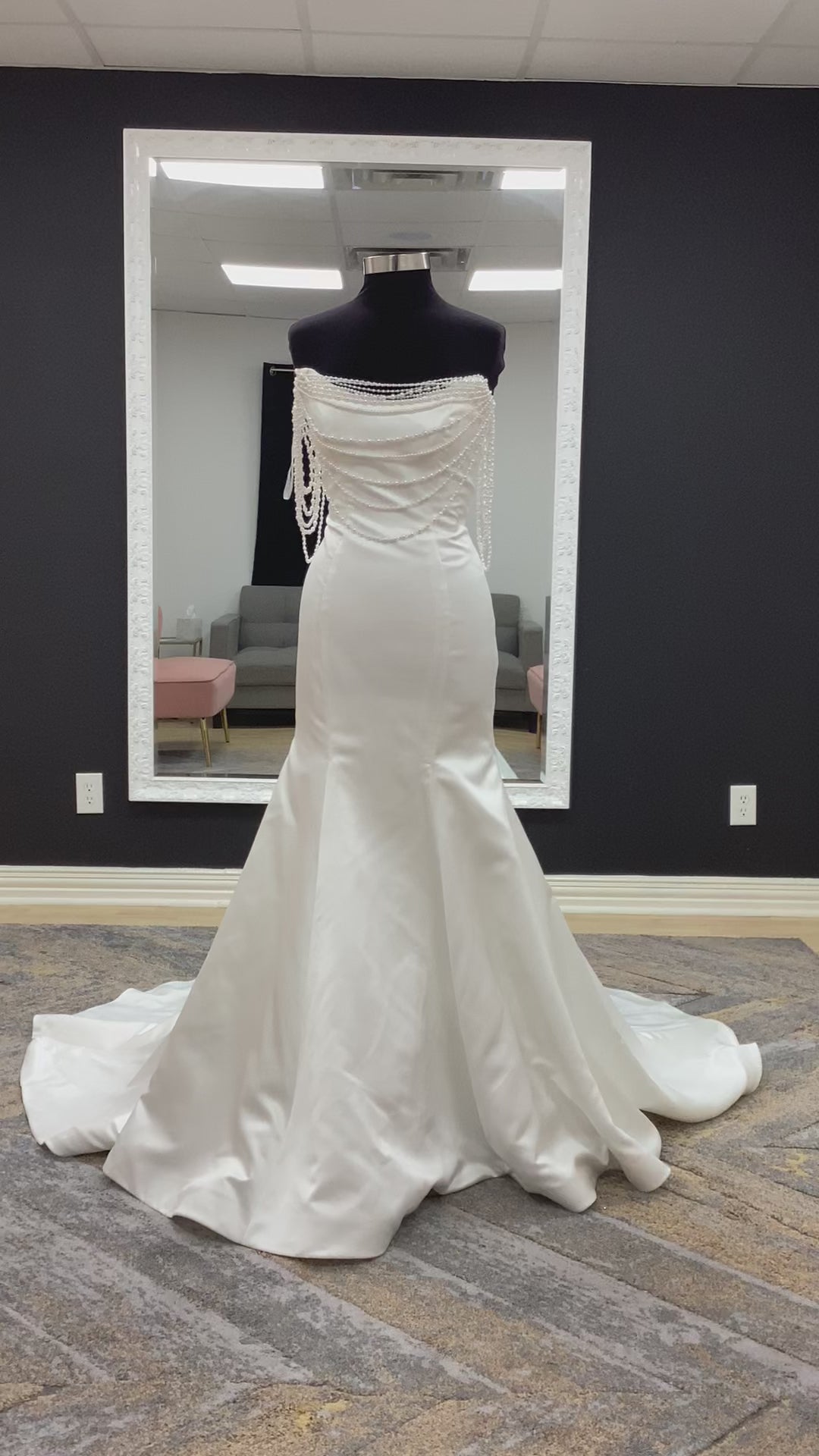  Morilee Atete wedding dress style 2921, a satin fit and flare bridal gown with a strapless scoop neckline and detachable pearl drape.