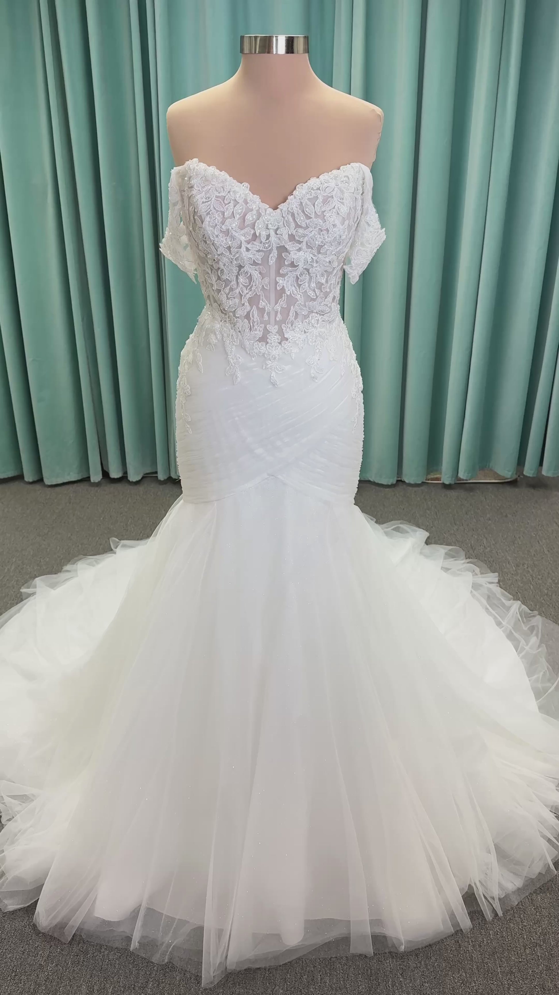 Morilee 4467 Rowena fit and flare wedding dress on mannequin with sheer corset bodice, frosted lace appliques, sweetheart neckline, and detachable off-the-shoulder sleeves