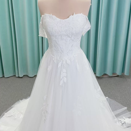 Jeslyn A-line Wedding Dress in Ivory, Size 14 — off-the-shoulder, floral appliqués cascading through tulle