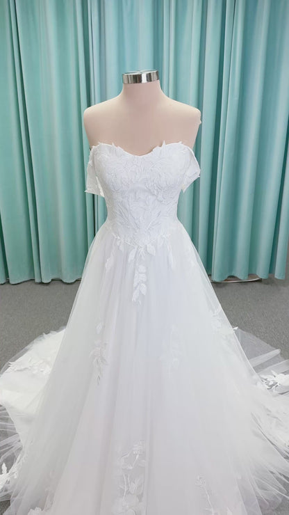 Jeslyn A-line Wedding Dress in Ivory, Size 14 — off-the-shoulder, floral appliqués cascading through tulle