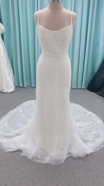 Morilee 1362 Tatianna fit and flare wedding dress with spaghetti straps, allover pearl and crystal beaded net, and sheer corset-boned back in Ivory/Champagne/Honey.