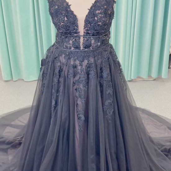 Morilee 5763 Rosa plus size A-line wedding dress on mannequin with plunging V-neckline, double banded waist, and crystal beaded floral lace appliques