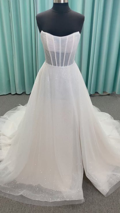 Morilee 15062 Tara A-line wedding dress in sparkle tulle over metallic net with strapless scoop neck, corset boning, and high front slit in Ivory/Champagne/Honey.