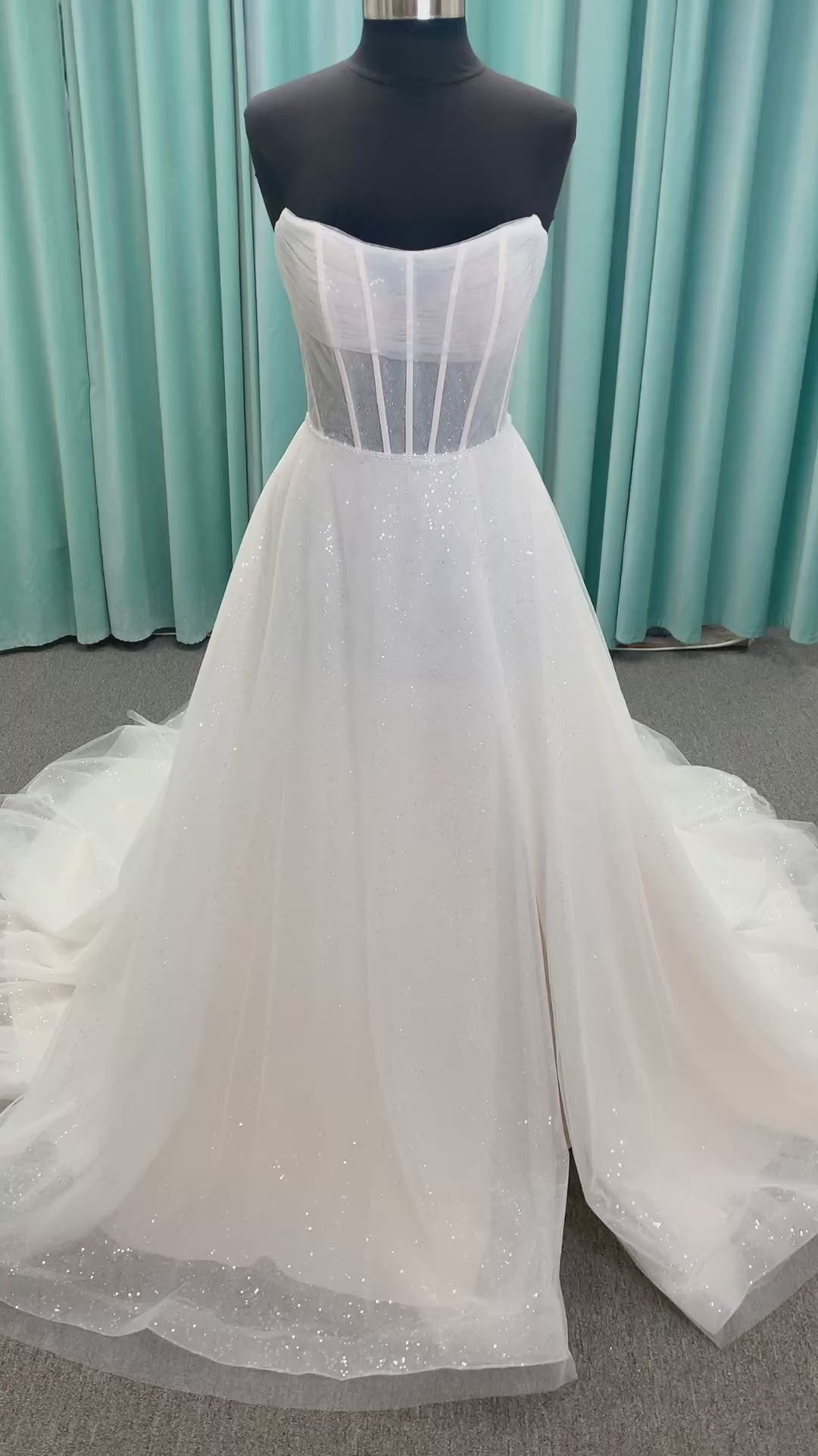 Morilee 15062 Tara A-line wedding dress in sparkle tulle over metallic net with strapless scoop neck, corset boning, and high front slit in Ivory/Champagne/Honey.