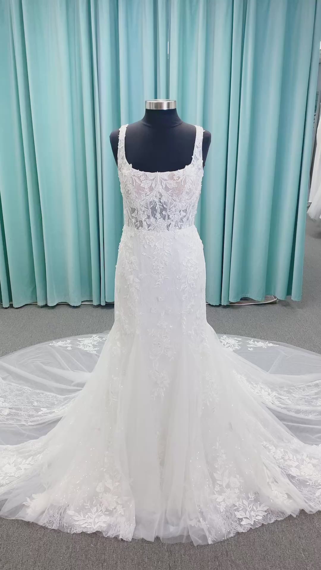 Morilee 2650 Rhea fit and flare wedding dress with square neckline, 3D beaded floral lace over sparkle tulle, corset boning, keyhole back, and godet skirt insets.