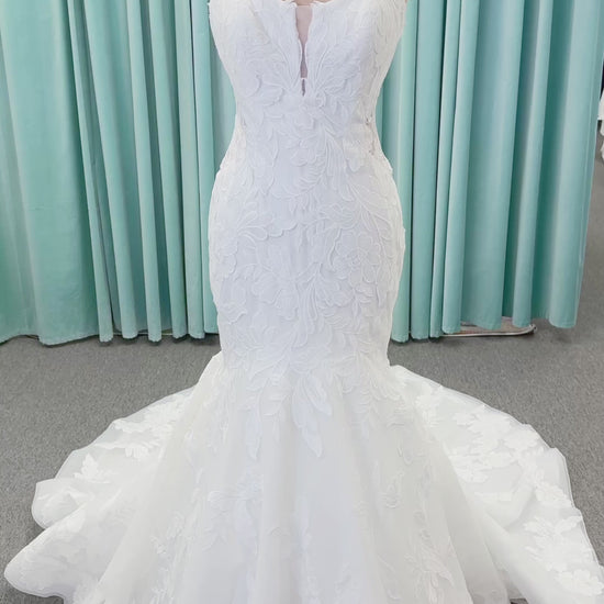 Morilee 2904 Selene fit and flare wedding dress on mannequin with spaghetti straps, plunge neckline, illusion side cutouts, and open back