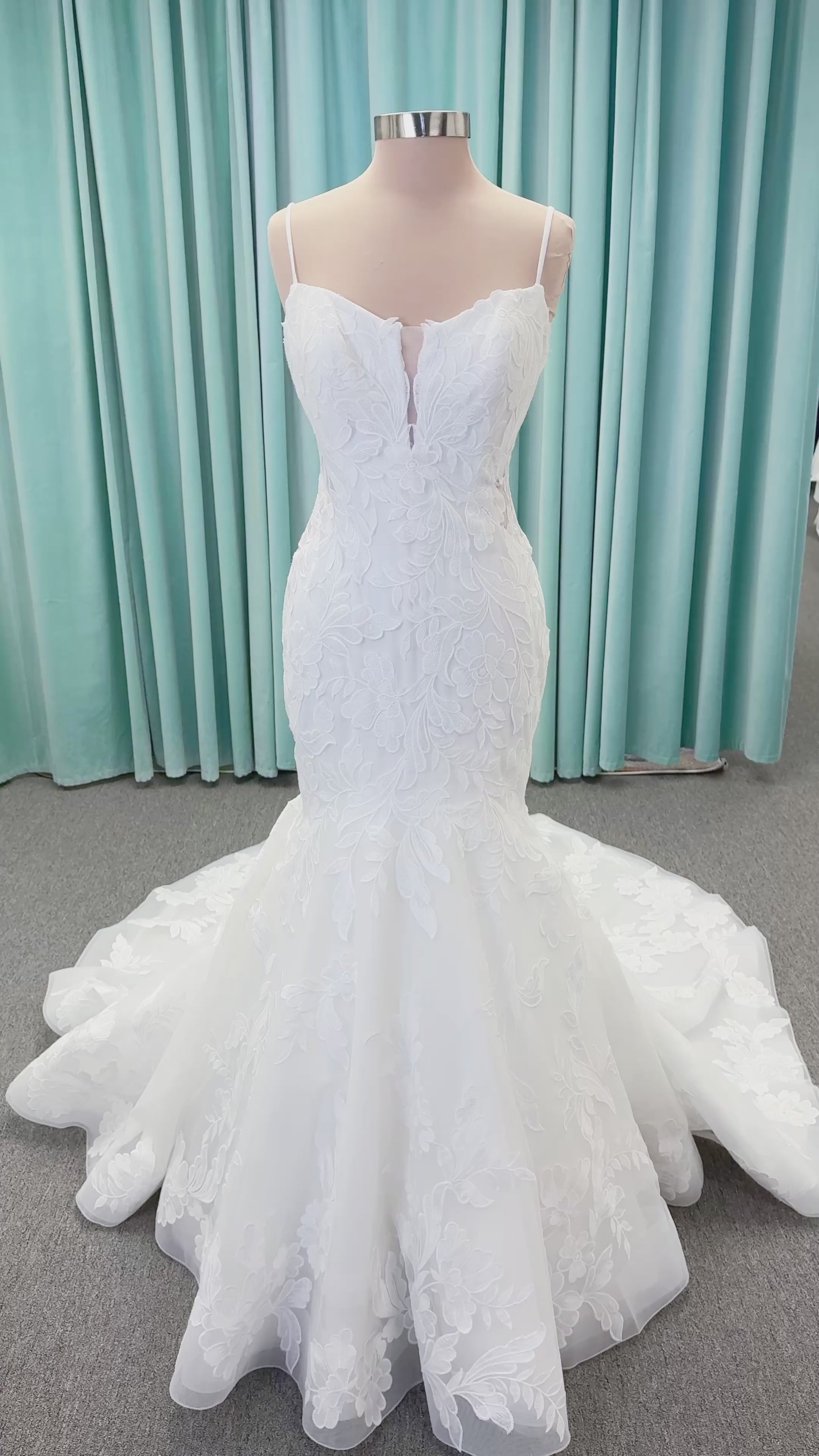 Morilee 2904 Selene fit and flare wedding dress on mannequin with spaghetti straps, plunge neckline, illusion side cutouts, and open back