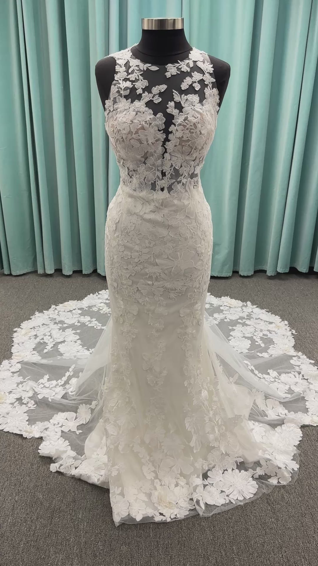 Essense of Australia D4141 lace fit-and-flare wedding dress with high illusion neckline, sheer bodice, low keyhole back, and shaped lace train