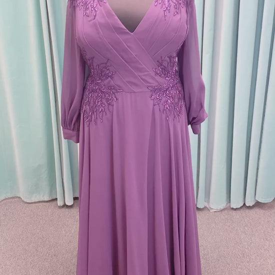 Morilee MLNY 72717 plus size A-line mother of the bride dress on mannequin with draped V-neckline, sheer bishop sleeves, beaded lace appliques at the shoulders and waist, and flowing chiffon skirt with sweep train
