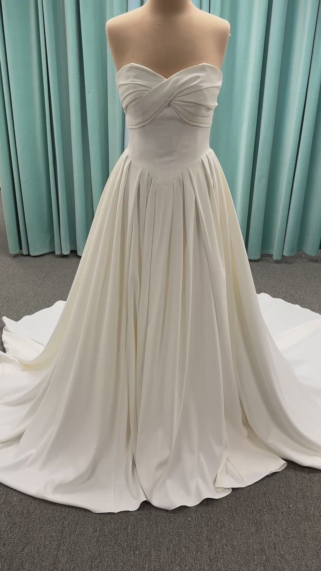 Essense of Australia D4269 matte satin A-line wedding dress with strapless draped bodice and Basque waist