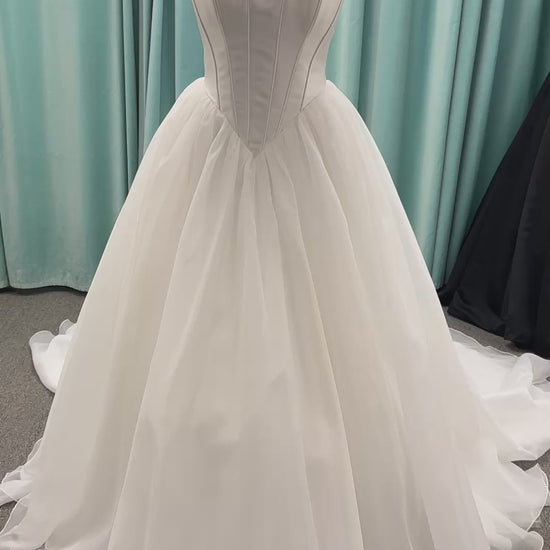 Stella York SY8222 ballgown wedding dress with scoop neckline, structured Mikado bodice, basque waist, and full organza skirt
