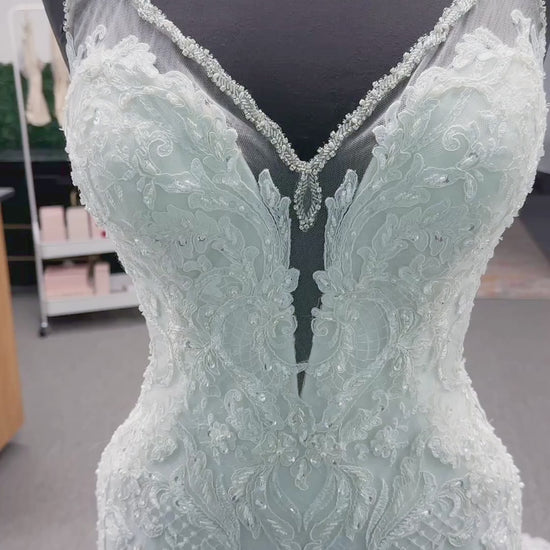 Morilee 2139 Sofia fit and flare wedding dress with crystal-trimmed deep V-neck, Alençon lace appliqués on Chantilly lace net, scalloped hem, and sheer train.