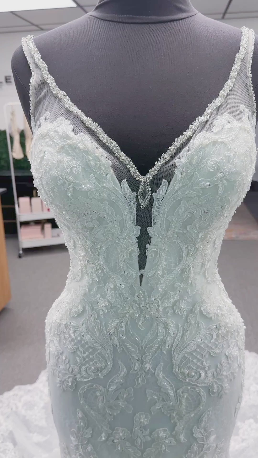 Morilee 2139 Sofia fit and flare wedding dress with crystal-trimmed deep V-neck, Alençon lace appliqués on Chantilly lace net, scalloped hem, and sheer train.