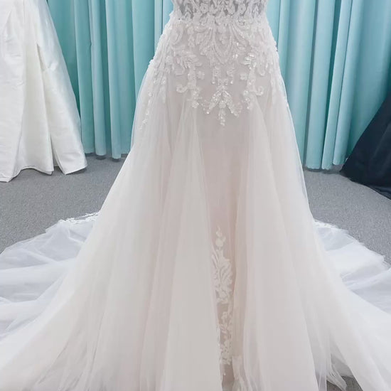 Morilee 2660 Regina A-line wedding dress with embroidered sweetheart neckline, matte sequins, drop waist, Chantilly lace tulle skirt, and lace-trimmed train.
