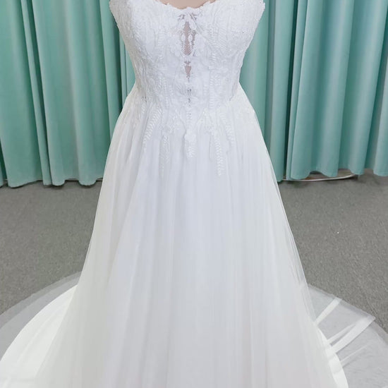 Carolyn A-line Wedding Dress in Ivory, Size 8 — strapless bodice, lace appliqués, beaded details, tulle skirt