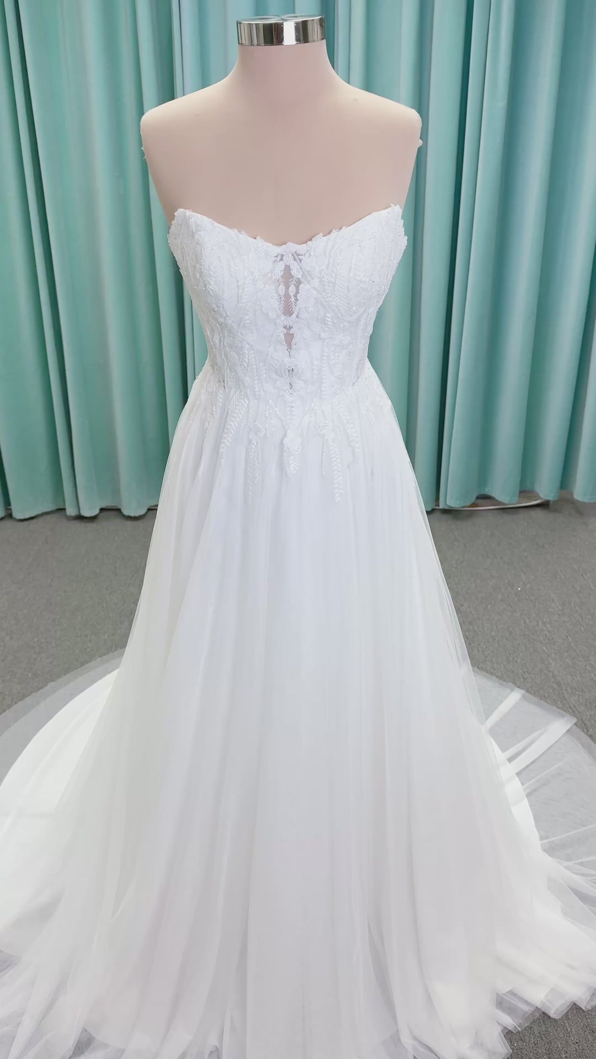 Carolyn A-line Wedding Dress in Ivory, Size 8 — strapless bodice, lace appliqués, beaded details, tulle skirt