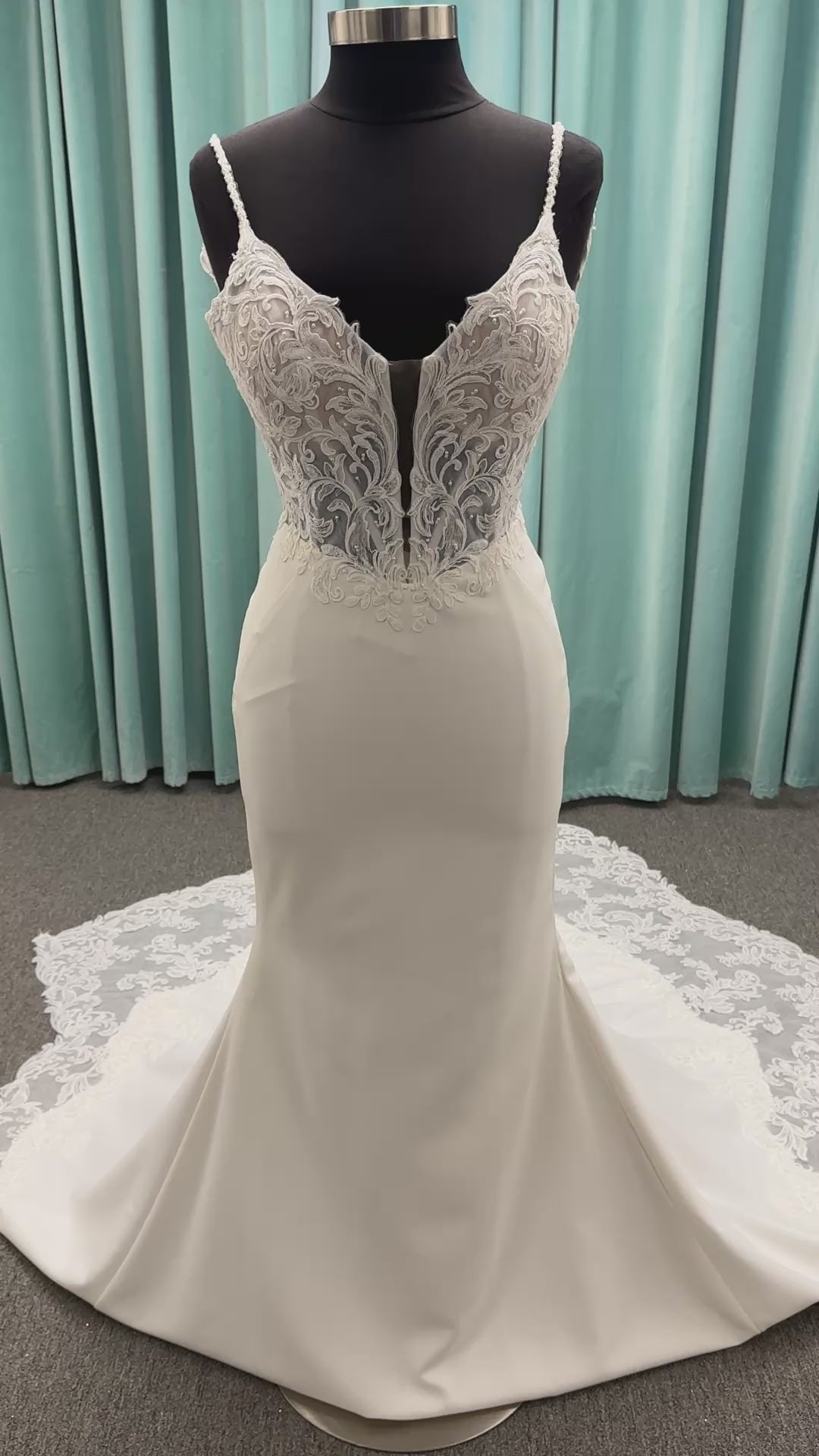 Essense of Australia D4181 column wedding dress with plunging V-neckline, pearl straps, lace bodice, and sleek crepe skirt with lace train