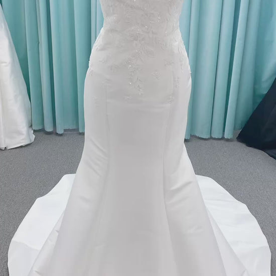 Morilee 2905 Atalanta fit and flare wedding dress in stretch Mikado with fold-over strapless neck, beaded lace bodice, and detachable double-loop embellished bow.