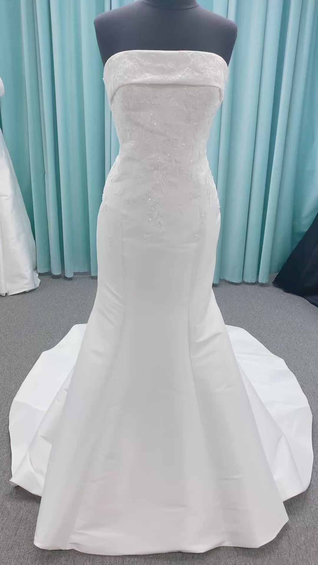 Morilee 2905 Atalanta fit and flare wedding dress in stretch Mikado with fold-over strapless neck, beaded lace bodice, and detachable double-loop embellished bow.