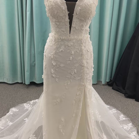 Stella York SY8157 glitter tulle fit-and-flare wedding dress with plunge neckline and floral lace appliqués