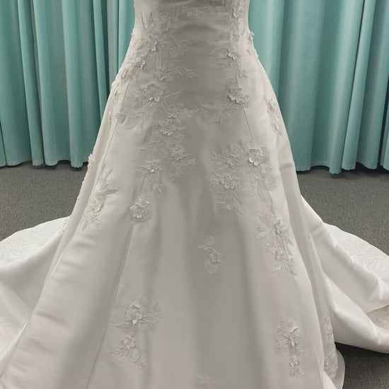 Strapless Mikado A-line wedding dress with straight neckline, lace detailing, and full skirt with hip volume by Essense of Australia Style D4479