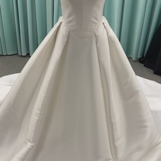 Essense of Australia D4451 Mikado ballgown with V-neckline, wide straps, basque waist, and full pleated skirt