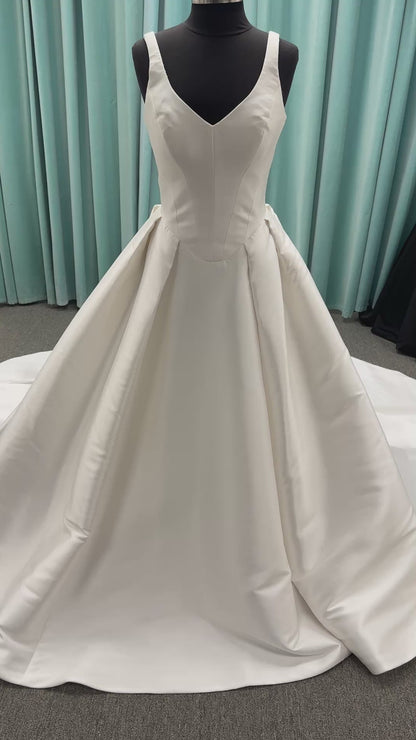 Essense of Australia D4451 Mikado ballgown with V-neckline, wide straps, basque waist, and full pleated skirt