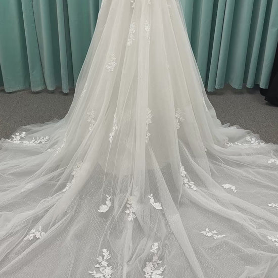 Off-the-shoulder lace A-line wedding dress with corset bodice, 3D floral appliqués, and glitter tulle skirt by Essense of Australia style D4360