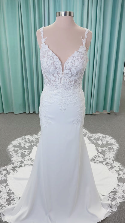 Morilee 2658 Raquel sheath wedding dress on mannequin with plunging neckline, frosted floral sparkle net bodice, crepe skirt, and keyhole back